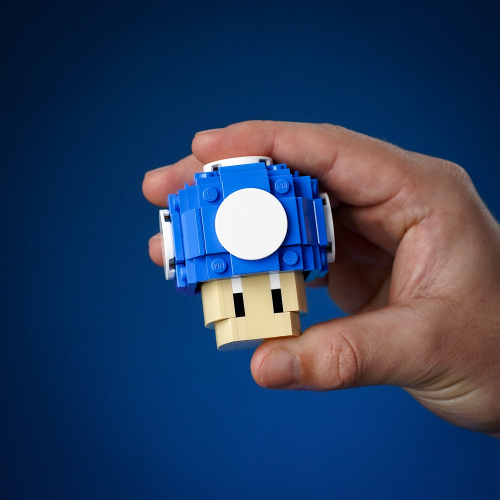 Tiny Blue Mushroom Made of LEGO® Bricks by Bricker Builds being held
