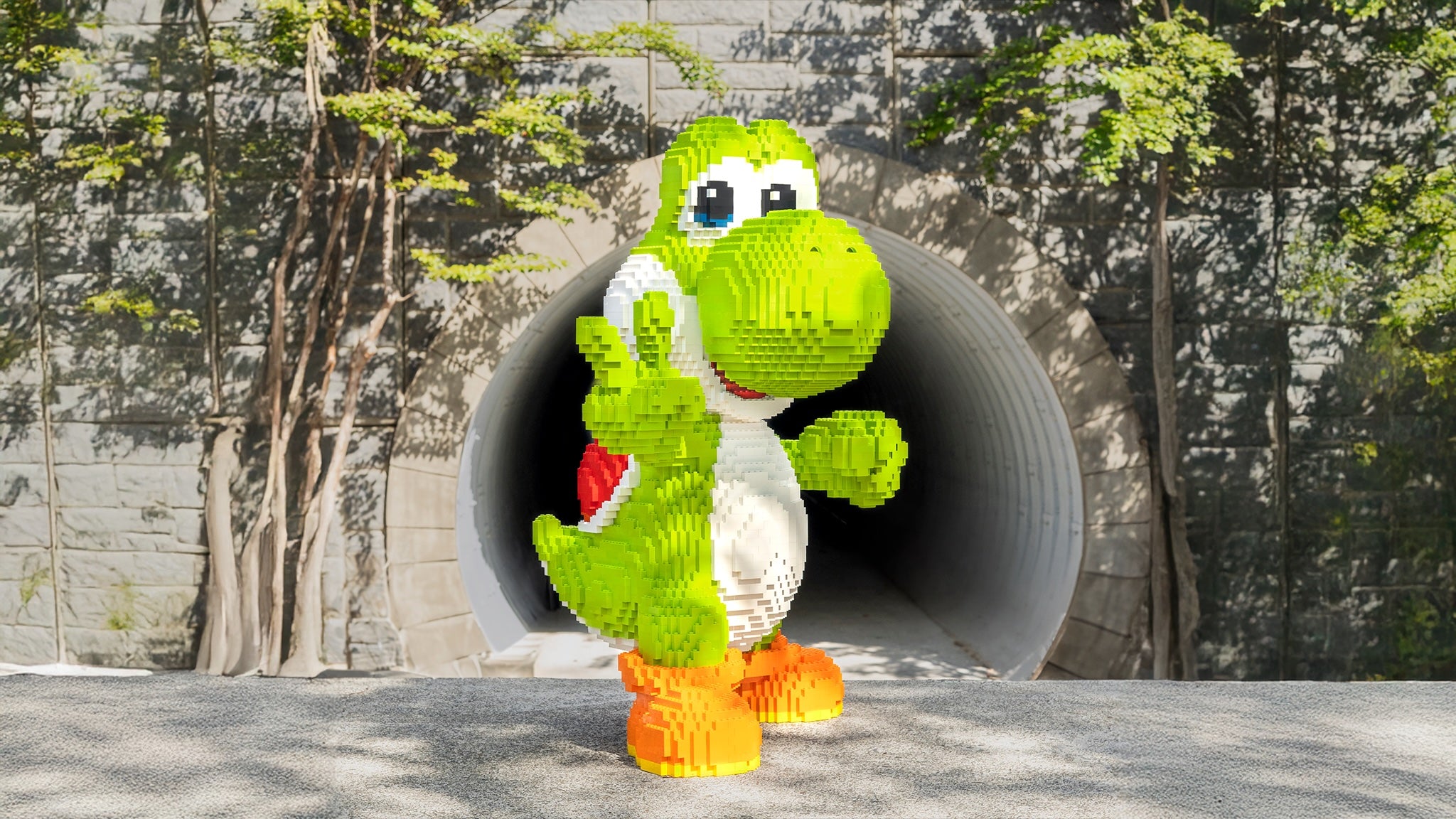 Italian Dinosaur by Bricker Builds Life-Sized Sculpture on the street built with LEGO bricks